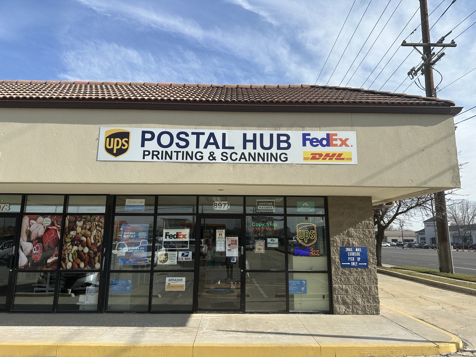 Postal Hub storefront at 8977 S 1300 W, West Jordan
